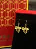 中国黄金（CHINA GOLD）黄金耳钉女款足金在逃公主蝴蝶结耳坠情人节生日礼物送女友爱人 【京速达】蝴蝶结耳坠【赠S925银圆珠耳钩】约0.6g 实拍图