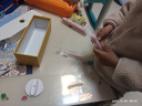 ximalong【儿童礼物】西马龙儿童电动牙刷充电式无线声波男女孩全自动3-6-12岁黄小丫 粉色（2刷头+壁挂架+儿童牙膏） 实拍图