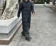 安踏（ANTA）六度芯羽绒服丨面包羽绒服男女冬季长款过膝连帽外套防泼水棉服 【京东仓发货】基础黑7905-3 75%绒子含量 S (165) 建议90-100斤 实拍图