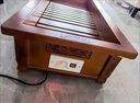 红健 实木取暖器家用暖脚器烤火炉电火箱火桶冬季暖足器电火盆火炉子 圆福实木1-4人款100*47*22cm 实拍图