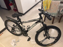 凤凰（Phoenix） 山地自行车成年人男士女士学生变速减震油刹线刹山地车自行车 黑白色三刀轮高碳钢车架 26寸（身高160-180左右） 24速数字指拨/默认线碟可改油碟 实拍图