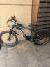 凤凰（Phoenix）山地车自行车成人男款女12岁到18岁青少年学生变速越野土坡车单车 钢架【全轴承/超省力】辐条轮黑蓝 24寸24速【身高138-168cm】 实拍图