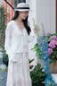 歌力思（ELLASSAY）【莱赛尔桑蚕丝】春夏新款系带镂空钩花防晒针织衫女EWD361M02300 纯净白 XS 实拍图