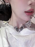 LNERATO露娜依蕾托怪诞舞会系列缎带珍珠手套耳钉女原创个性耳饰 枪黑色 56 实拍图