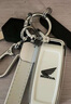 郡昂适用25款新大洲本田NS150GX钥匙包套踏板摩托车NPF125遥控钥匙扣 B款白色(背标)单壳 实拍图