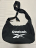 Reebok锐步防泼水耐磨轻量流浪饺子包 户外通勤旅行单肩斜挎包可调肩带 实拍图