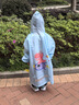牧萌 儿童雨衣男女童带书包位宝宝幼儿园小学生雨鞋套装防水卡通雨披 浅蓝火箭恐龙 XL码（建议身高115-125cm） 实拍图
