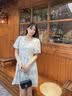 谜秀蓝色碎花度假风连衣裙2026春季新款法式小个子显瘦减龄度假短裙 杏色 L 实拍图