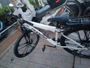 凤凰上海凤凰山地车自行车男士女式学生成人变速宽胎越野公路赛单车 【钢架/全套竞速轴承】十刀消白 27.5寸24速【建议168-198cm】 实拍图