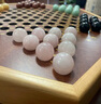 御圣 跳棋玻璃珠跳跳棋木质跳棋盘早教启蒙亲子益智游戏桌游儿童礼物 特大号六角型跳棋【宝石珠套装】 实拍图