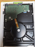 希捷（SEAGATE）NAS硬盘 10TB 256MB 机械硬盘 CMR垂直 静音低耗 数据恢复服务 3.5英寸 希捷酷狼 ST10000VN000 实拍图