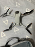 大疆（DJI）Mini 3 航拍无人机 便携可折叠无人机航拍飞行器 Mini 3 标准版【赠配件礼包】 官方标配（不含随心换） 套餐二：单肩包+128g高速卡+读卡器 实拍图