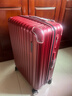 美旅行李箱24英寸拉杆箱旅行箱轻韧大容量密码箱飞机轮婚礼箱 NL7红色 实拍图