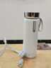 飞利浦（PHILIPS）随行电热水杯便携迷你烧水杯316不锈钢内胆电热杯保温杯 【奶油白】烧水杯恒温款 350ml 实拍图