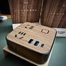公牛（BULL）20W PD苹果快充插座/插线板/插排/接线板/拖线板 3USB+4孔 黑色木纹全长1.8米 GN-R322Q20 实拍图