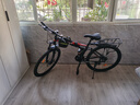 凤凰（Phoenix）可折叠山地车自行车成人男女新款式学生12到18岁变速越野软尾单车 折叠双避震【密封全轴承】钢架/辐条轮黑红 26寸-27速【身高158-188cm】 实拍图
