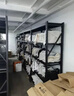 实邦仓库货架仓储置物架轻型家用库房仓库储物铁架子金属快递货架子钢 黑色-4层-主架（送安全栓） 工厂直销加厚180KG/层100*50*200 实拍图