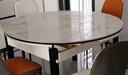 奥利克丝 亮光岩板餐桌椅组合 现代简约实木餐桌可伸缩折叠圆桌吃饭桌子 亮光雪山白-黑白框架轻奢皮椅款 1.35米 一桌六椅【12MM加厚岩板】 实拍图