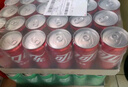 可口可乐（Coca-Cola）汽水碳酸饮料330ml*24罐*2箱 家庭组合装 新老包装随机发 可乐24罐+芬达24罐（热卖） 实拍图