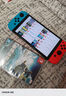 任天堂（Nintendo）【国内保税仓】Switch2/1代 OLED/续航加强日版/港版便携家用ns体感游戏掌机 日版OLED红蓝+塞尔达王国之泪(保税仓） 实拍图