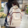 回力书包学生女新款初中生高中生大容量背包简约双肩包宽肩带书包轻便 白配红【升级款+冲天鸭挂件】 实拍图