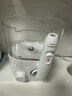 飞利浦（PHILIPS）【肖战推荐】家用台式冲牙器洗牙器台式 四向水流科技4种洁齿模式 水魔方白色HX3911/41 实拍图