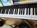 贝琪（Betsy）B190磁吸钢琴88键成人便携式电钢琴学生幼师专业折叠手卷电子钢琴 熊猫黑+果冻琴包+支架 实拍图