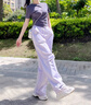 FILA 斐乐官方杨幂同款梭织长裤时尚简约宽松休闲裤子女 淡奶油紫-PU M （165/66A/M） 实拍图