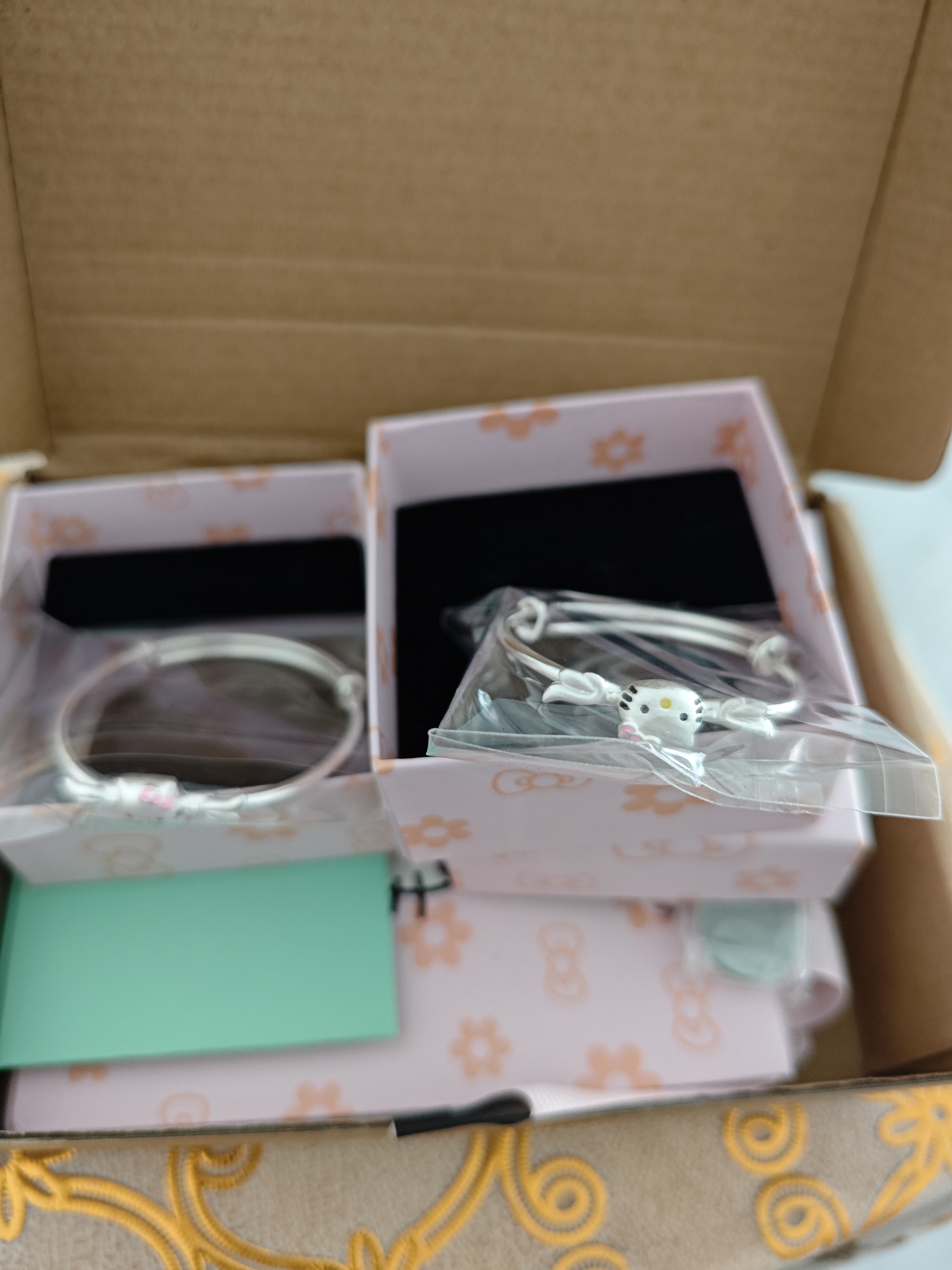纪博驰天使kt猫女宝宝手镯足银999小孩儿童中大童学生银镯子凯蒂猫礼物 中童款6-13岁1个12克+送KT礼盒 实拍图