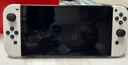任天堂（Nintendo）【国内保税仓】Switch2/1代 OLED日版/港版游戏机续航加强版ns体感掌机便携家用主机 日版OLED白色64G+塞尔达王国之泪 （保税仓） 实拍图