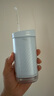 飞利浦（PHILIPS）【肖战推荐】生日礼物 伸缩便携冲牙器洗牙器 情侣送男生/女友 含3款喷嘴HX3331不困蓝 实拍图