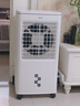 美的（Midea）冷风扇 家用立式单冷空调扇客厅卧室移动冷风机冰晶水冷小空调制冷机 定时遥控制冷风扇 AAG12XF 实拍图