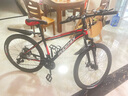 凤凰（Phoenix） 山地自行车成年人男士女士学生变速减震油刹线刹山地车自行车 黑红色辐条轮高碳钢车架 26寸（身高160-180左右） 27速数字指拨/默认线碟可改油碟 实拍图