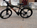 凤凰上海凤凰山地车自行车男士女式学生成人变速宽胎越野公路赛单车 铝架油刹/全套竞速轴承/三刀消黑 26寸27速【建议身高158-188cm】 实拍图
