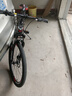 金武端自行车成人山地车公路赛车单车骑行变速超轻越野中学生初中青少年 旗舰版-辐条轮-黑红色 26寸24速 实拍图