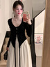 艾美琦美（AIMEIQIMEI）法式夏季女士吊带连衣裙2025新款度假风夏天女装套装显瘦白色裙子 黑色开衫+连衣裙 M 实拍图