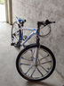 凤凰（Phoenix） 山地自行车成年人男士女士学生变速减震油刹线刹山地车自行车 白蓝色十刀轮高碳钢车架 26寸（身高160-180左右） 24速数字指拨/默认线碟可改油碟 实拍图