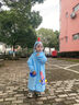 牧萌 儿童雨衣男女童带书包位宝宝幼儿园小学生雨鞋套装防水卡通雨披 浅蓝火箭恐龙 M码（建议身高95-105cm） 实拍图