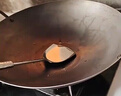 章丘手工铁锅农村柴火灶大铁锅无涂层老式不粘炒菜锅家用双耳炒锅 【免开锅】送铲+盖 50cm 实拍图