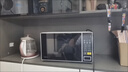美的（Midea）家用小型多功能微波炉 家庭容量20L 焖炖煮热 转盘加热 智能菜单 触控面板 易洁内腔 M1-L213C 黑色 实拍图