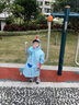 牧萌 儿童雨衣男女童带书包位宝宝幼儿园小学生雨鞋套装防水卡通雨披 浅蓝火箭恐龙 L码（建议身高105-115cm） 实拍图