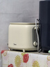 美的（Midea）面包机多士炉早餐烤吐司机 烤三明治面包片2片小型家用不锈钢早餐机轻食机 6档烘烤带防尘盖 RP04 实拍图