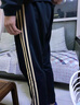 阿迪达斯 （adidas）长裤男秋季宽松透气直筒裤跑步运动防风休闲裤 黑金（经典款） L 实拍图