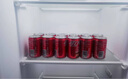 可口可乐（Coca-Cola）汽水 碳酸饮料 200ml*24罐  迷你摩登罐 新老包装随机发货 实拍图