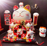 智汇招财猫开业大摆件自动招手电动摇手大号陶瓷新店开业大吉乔迁礼物 【八方来财】28*22*27 【礼盒+坐垫+围脖】电池插电两用 实拍图