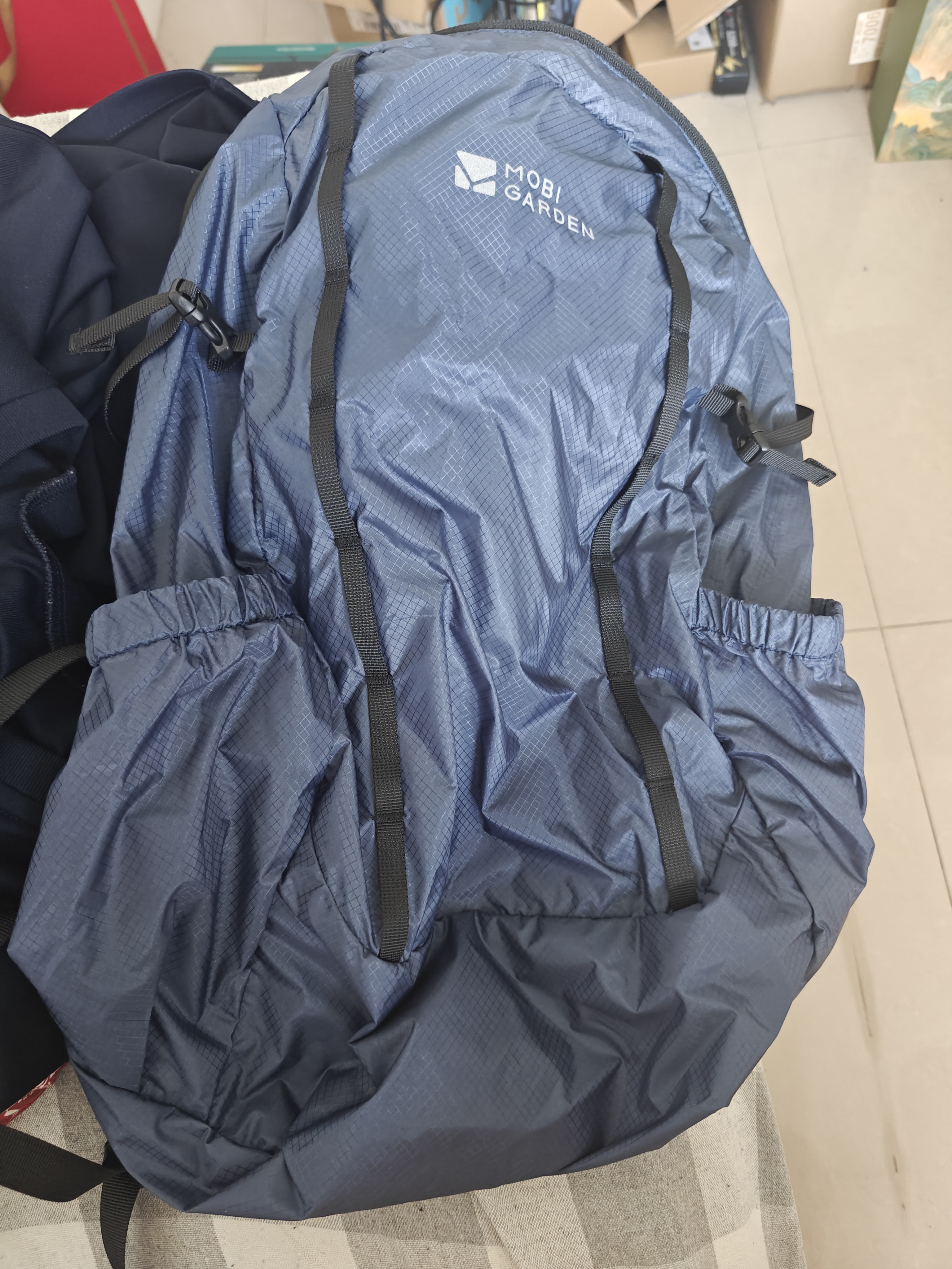 牧高笛冷山轻羽皮肤包 户外超轻防水折叠背包旅行通勤双肩包20L 【拉链款】深海蓝 实拍图
