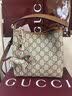 GUCCI古驰GG Emblem系列小号水桶包 米色、深棕色和棕色 均码 实拍图