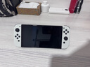 任天堂（Nintendo）【国内保税仓】Switch2/1代 OLED日版/港版游戏机续航加强版ns体感掌机便携家用主机 日版OLED白色64G+塞尔达王国之泪 （保税仓） 实拍图