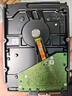 希捷（SEAGATE）NAS硬盘 4TB 256MB 机械硬盘 CMR垂直 静音低耗 数据恢复服务 3.5英寸 希捷酷狼 ST4000VN006 实拍图