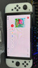 任天堂（Nintendo）【国内保税仓】Switch2/1代 OLED日版/港版游戏机续航加强版ns体感掌机便携家用主机 日版OLED白色64G+王国之泪+奥德赛（保税仓） 实拍图